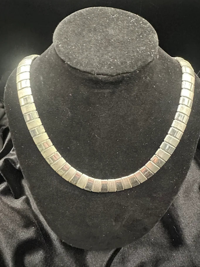 Silver tone segmented collar necklace