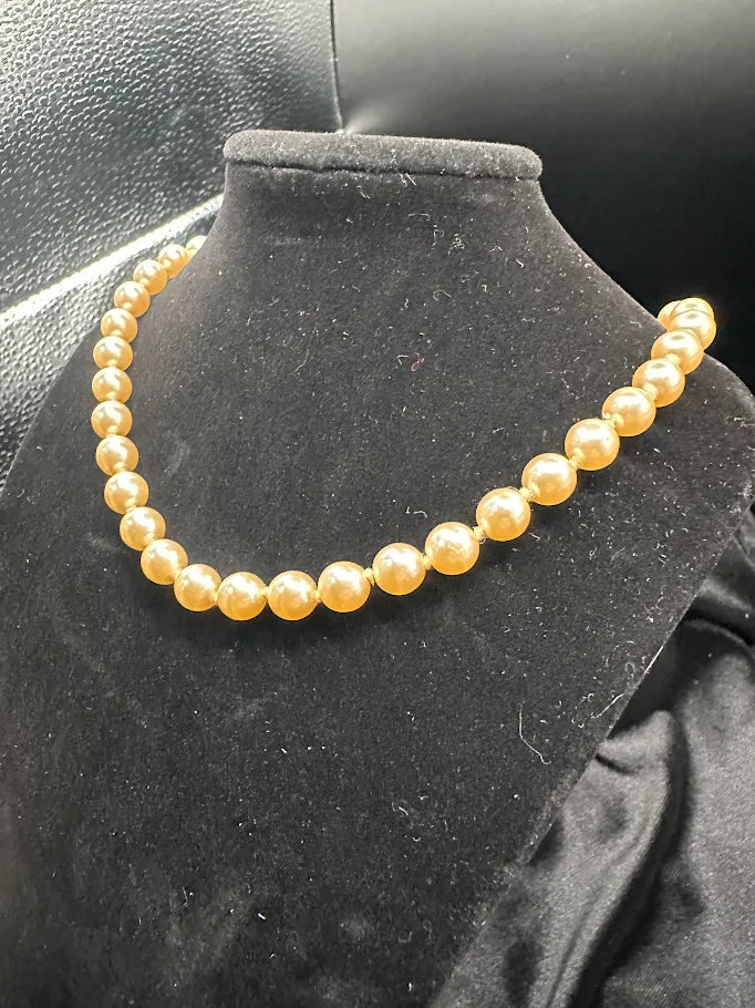 Gold Tone Cream Pearl Style Necklace with Decorative Clasp