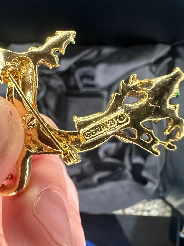 Vintage Christmas Gold Tone Reindeer Brooch with Green Enamel Holly and Red Rhinestone Accent