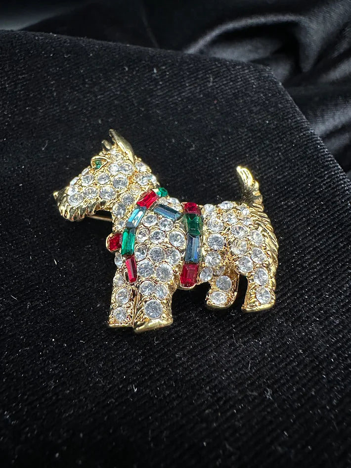 Signed Gold tone terrier brooch with clear red green and blue crystals