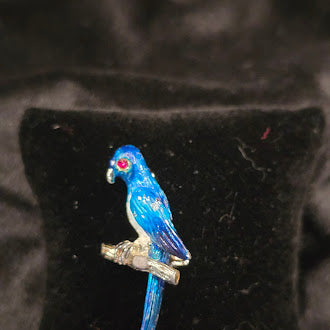 Blue enamel parrot brooch on branch with gold tone trim