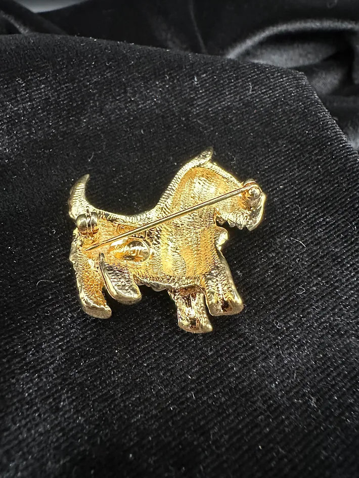 Signed Gold tone terrier brooch with clear red green and blue crystals