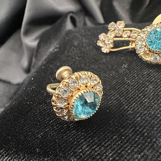 Vintage Rhinestone Brooch and Screw Back Earrings Set Gold Tone Blue Center Stones Clear Rhinestone Halo Matching Jewelry Set
