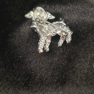 Silver Tone Lamb Brooch With Textured Finish And Blue Bow Detail