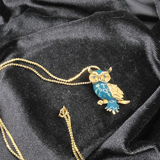 Gold tone owl pendant necklace with blue enamel detail