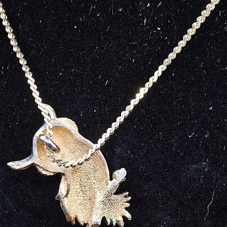Gold tone owl pendant necklace with blue enamel detail