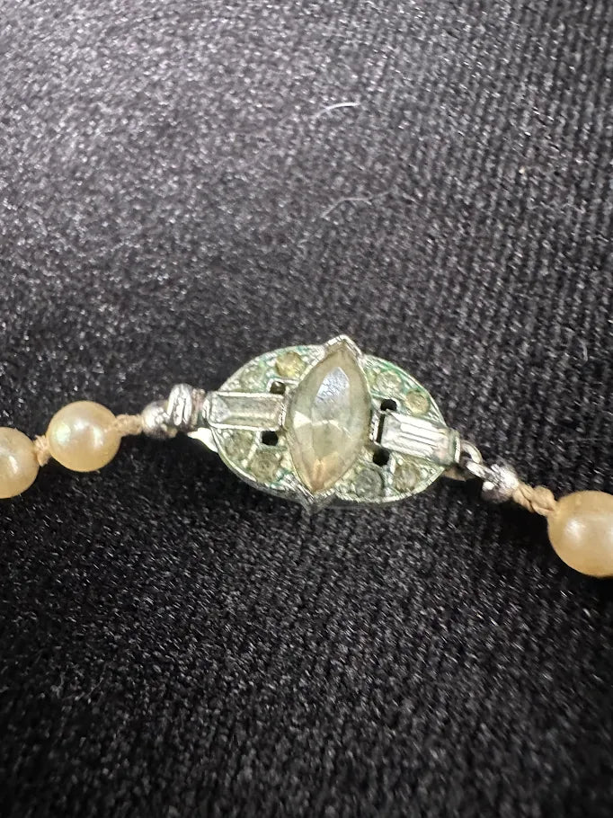 Gold Tone Cream Pearl Style Necklace with Crystal Accent Clasp
