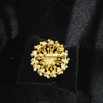 Vintage Austria Signed Gold Tone Rhinestone Brooch with Pink and Lavender Baguette Stones