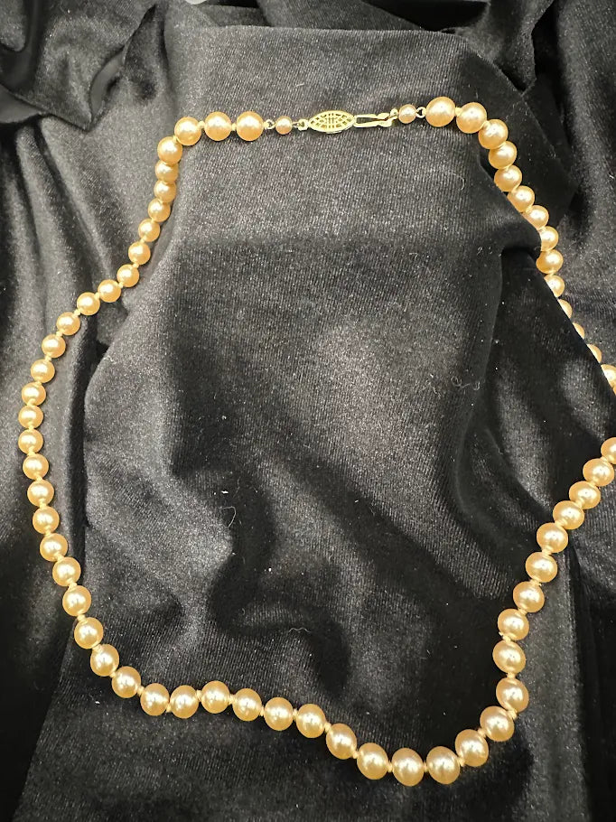Gold Tone Cream Pearl Style Necklace with Decorative Clasp